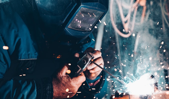 Factory floor with metal scrap and production waste bins